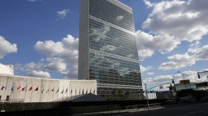 Clouds are reflected off the Secretariat Building of the UN headquarters during the 67th United Nations General Assembly, in New York